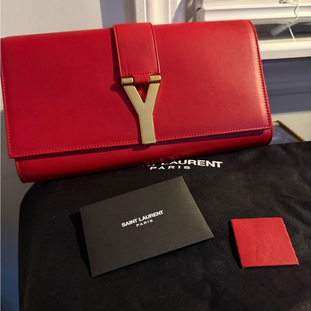 Saint Laurent Red Leather clutch